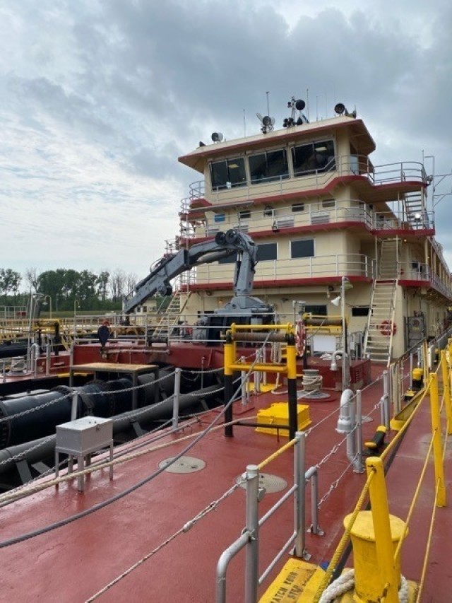 The USACE Vicksburg District's Dredge Jadwin prepares to depart the Vicksburg Harbor prior to the 2021 dredging season. The dredge's dustpan-shaped appendage allows it to clear a path through the sediment at bottom of the Mississippi River. The...