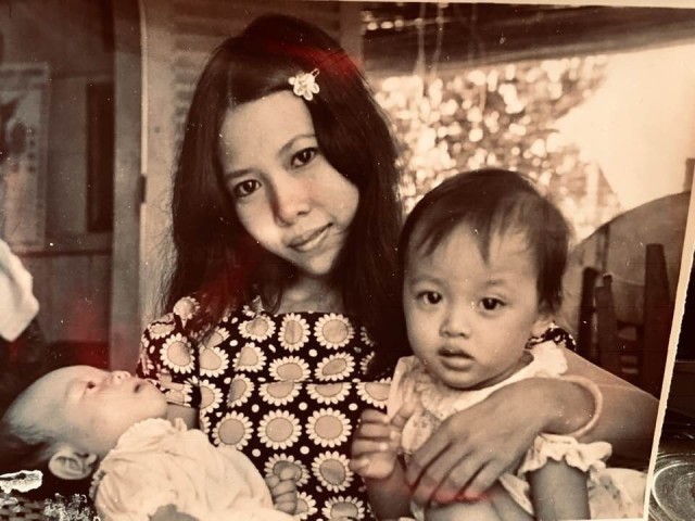 A 1973 photo shows Danielle Ngo, right, with her mother, Thai-An, and baby sister Lan-Dinh in South Vietnam.