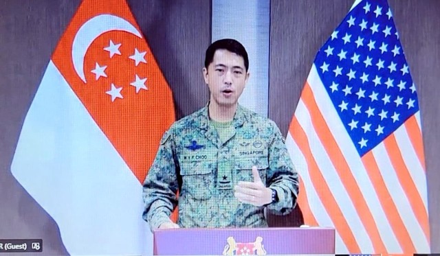 Brig. Gen. Frederick Choo, Chief of Staff-General Staff, Singapore Armed Forces virtually delivers remarks during the 2021 Exercise Tiger Balm closing ceremony from Singapore, May 13, 2021. Exercise Tiger Balm is the longest-running bilateral exercise the Singapore Armed Forces has with any defense force partner since 1981. (U.S. Army National Guard photo by Sgt. Matthew A. Foster)