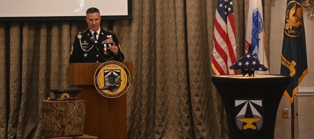 Command Sgt. Maj. Paul Biggs speaks to the audience during his retirement ceremony at Joint Base Langley-Eustis, Virginia, May 13, 2021. Biggs retired after serving more than 33 years in various levels of leadership to include his last position as the Futures and Concepts Center command sergeant major. (U.S. Army photo by David Miller)