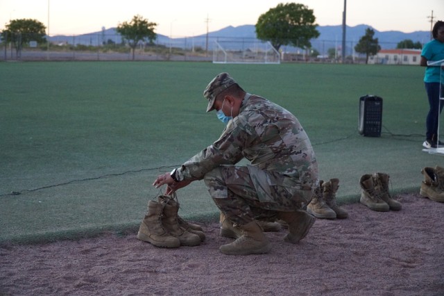 Soldiers, civilians and families from across the installation attend a candlelight vigil in remembrance of victims of sexual assault, sexual harassment and domestic violence concluding the 111th Military Intelligence Brigade’s Sexual Assault...