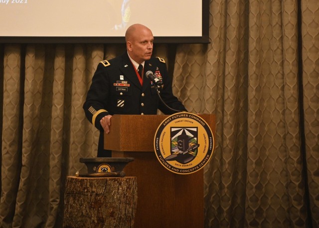 U.S. Army Maj. Gen. Ross Coffman, director of the Next Generation Combat Vehicle Cross-Functional Team, speaks to the audience at Command Sgt. Maj. Paul Biggs retirement ceremony at Joint Base Langley-Eustis, Virginia, May 13, 2021. Biggs retired after serving more than 33 years in various levels of leadership to include his last position as the Futures and Concepts Center command sergeant major. (U.S. Army photo by David Miller)