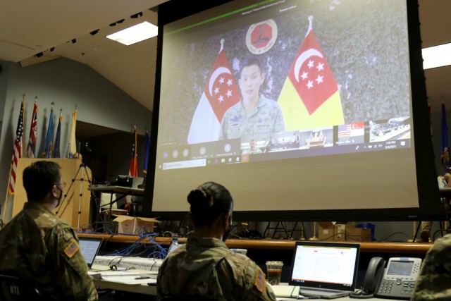 Brig. Gen. Lee Yi-Jin, Commander of the 6th Division, Singapore Armed Forces, virtually delivers remarks during the Exercise Tiger Balm 2021 opening ceremony at the 298th Regiment, Regional Training Institute (RTI), Waimanalo, Hawaii, May 6, 2021. Exercise Tiger Balm is the longest-running bilateral exercise the Singapore Armed Forces has with any defense force partner since 1981. (U.S. Army National Guard photo by Sgt. Matthew A. Foster)