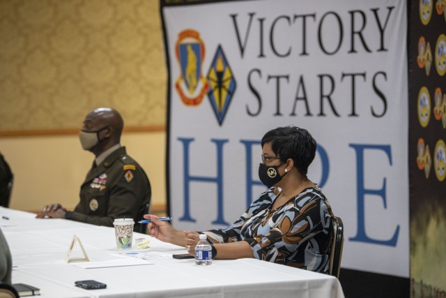 Pam Beagle, wife of Fort Jackson Commander Brig. Gen. Milford H. 'Beags' Beagle Jr., asks a question during the Military Spouse Appreciation Day event at the NCO Club May 7. The event highlighted, honored spouses' contributions to Fort Jackson.