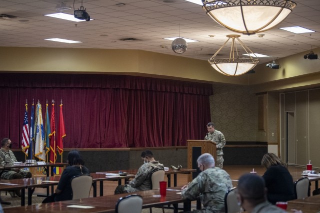 Chaplain (Cpt.) Mustapha RahoUchen gives the prayer for the nation during the National Day of Prayer luncheon at the NCO Club, May 6.