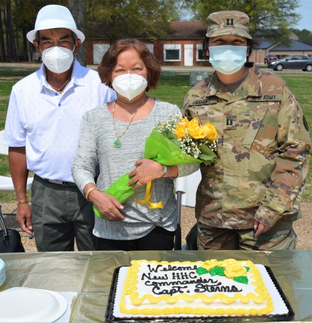 Capt. Theang Sterns, incoming 94th TD-FS Headquarters and Headquarters Company commander, celebrates with her parents following the unit's change of command ceremony at Fort Lee's Combined Arms Support Command Headquarters. The ceremony was held...