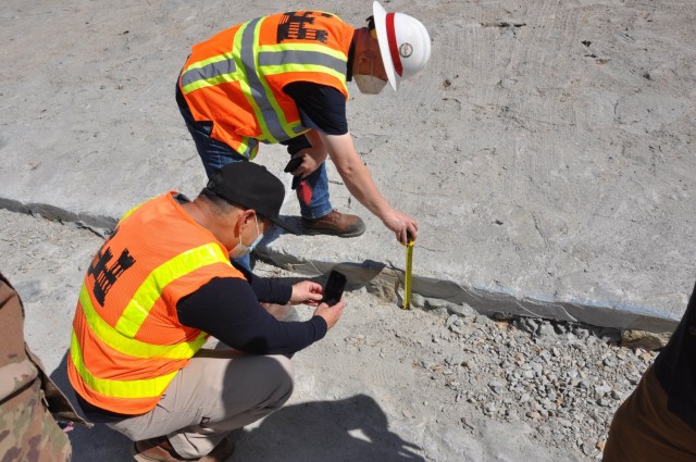 Maintenance management specialist Kelly Howard takes a measurement, May 4, 2021, along the banks of the Los Angeles River in Glendale, California, during a project site visit. The Corps manages projects along 226,000 square miles of Southern...
