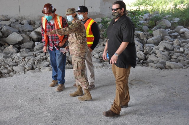 Project manager Lt. Col. Malia Pearson, U.S. Army Corps of Engineers Los Angeles District, reviews progress, May 4, 2021, under a bridge over the Los Angeles River. The Corps manages projects along 226,000 square miles of Southern California,...