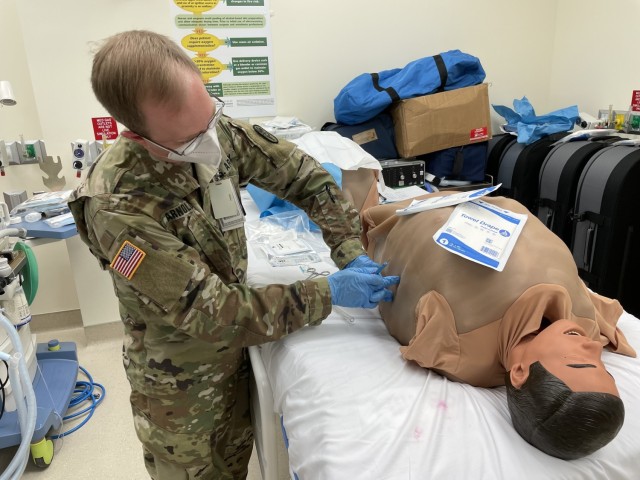 Martin Army Community Hospital's ER Physician Capt. Jacob Arnold inserts a chest tube, during Brooke Army Medical Center's FCCS/ICTL Course.