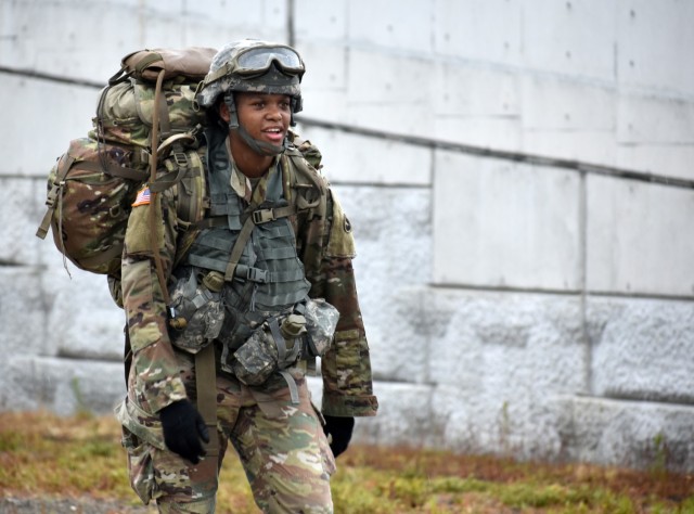 Spc. Brooke Hendricks, assigned to the U.S. Army Japan Band, competes in the 12-mile ruck march during the 2021 U.S. Army Japan Best Warrior Competition at Sagami General Depot, Japan, May 13. Hendricks came in fourth overall with a time of 2 hours, 55 minutes, but was first in the event’s Soldier category. She also came in first in the competition’s Soldier category.