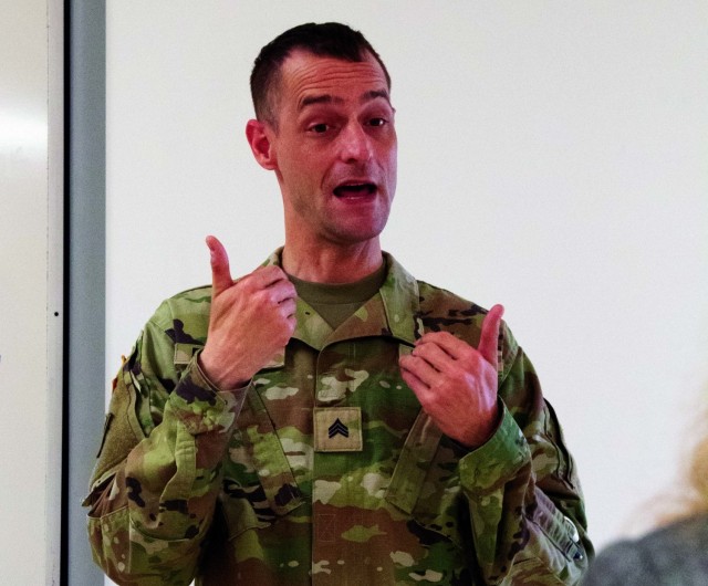 Michigan Guard Soldier helps at vaccination events with sign language