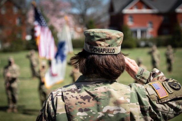Brig. Gen. (Retired) Marilyn Chiafullo salutes the national colors during a ceremony where she relinquished command of the United States Army Reserve Legal Command to Brig. Gen. William Dyer on Friday, March 26.  Chiafullo led the USARLC since April, 2019, enhancing integration with fellow Reserve and Active service components while maintaining the unit’s readiness during the COVID-19 pandemic.
