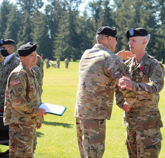 Brig. Gen. Timothy P. White, the former 593rd Expeditionary Sustainment Command commanding general, is awarded the Legion of Merit medal by the I Corps commanding general, Lt. Gen. Randy A. George, during the ESC change of command ceremony at Watkins Field here at Joint Base Lewis-McChord, May 14, 2021.  

“To the Soldiers, NCOs, Officers, and families of the 593rd Expeditionary Sustainment Command, I am so proud of all you,” White said.  “Your contributions to our nation are often understated, but never, ever unappreciated.”


White relinquished his position as the organization welcomed Col. Martine S. Kidd and Command Sgt. Maj. Terrence T. Scarborough as the organization’s new command team. (U.S. Army photo by Sgt. 1st Class Tony White, 593rd ESC)