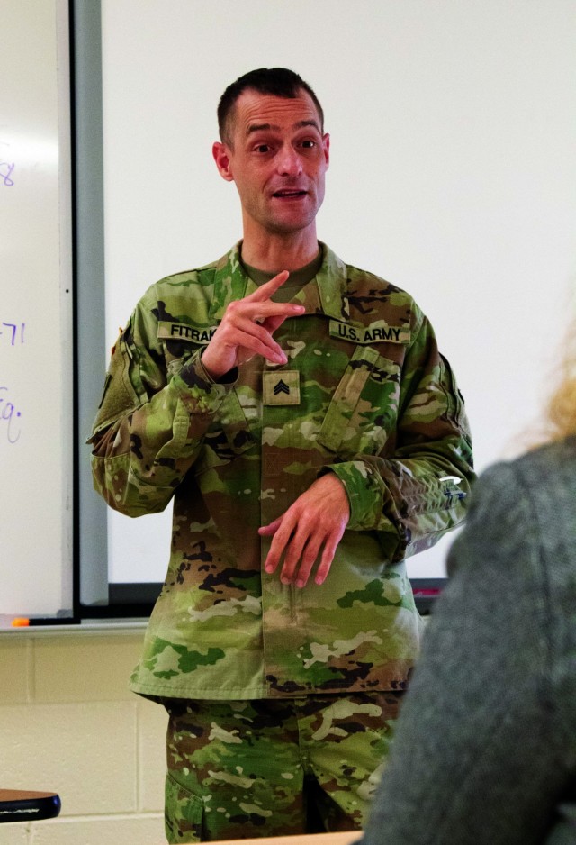 Michigan Guard Soldier helps at vaccination events with sign language
