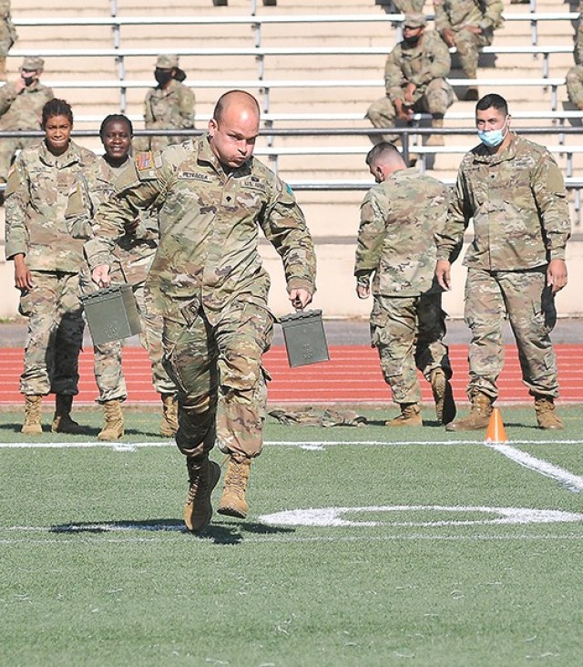 Spc. James Petracca, Charlie Company, 262nd Quartermaster Battalion, sprints to the finish during the ammo carry event of the 23rd QM Brigade's Soldier Stakes Competition May 14 at Williams Stadium. Normally held as a field event at various...