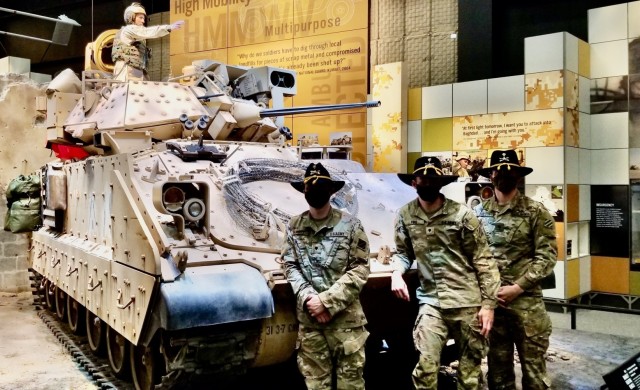 From left to right, Spc. Philip Starkes, Spc. Nicholas Ford and Spc. Tracy Fulton all assigned to Company D, 6th Squadron, 8th Cavalry Regiment, 2nd Armored Brigade Combat Team, 3rd Infantry Division, worked with the National Museum of the U.S....