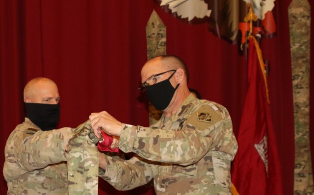 With Task Force Essayons consolidating within the Transatlantic Expeditionary District, the colors of the former command will remain cased, as Colonel John Haas, Jr. and SGM William Klaers complete this final act on May 15, 2021. (Photo by Rick...