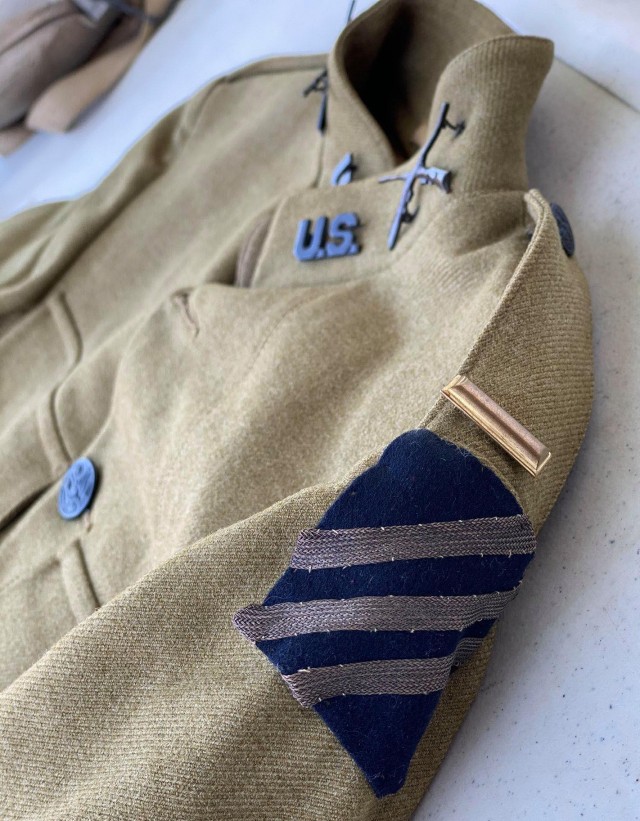 The WWI uniform of 2nd Lt. Delmore Adams is displayed during a terrain walk and battle analysis event that replaced the traditional staff ride held by the University of Maine Army ROTC program April 24, 2021. A veteran of 3rd Infantry Division and a resident of Maine, Adams was twice awarded the French Croix de Guerre as well as the Silver Star for his bravery as part of the 3rd ID in 1917-1918. Artifacts like the uniform were used to teach cadets about what individuals like themselves did when put into harrowing situations in the crossroads of history. (Courtesy Photo, Capt. Jonathan Bratten)