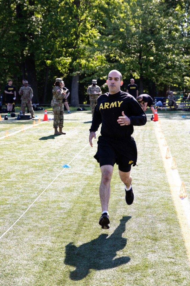 A soldier assigned to Headquarters, Headquarters Company, U.S. Army Reserve Legal Command conducts the Sprint-Drag-Carry event of the Army Combat Fitness Test on Saturday, May 15th aboard Naval Support Activity Bethesda, Maryland.  The multi-event...