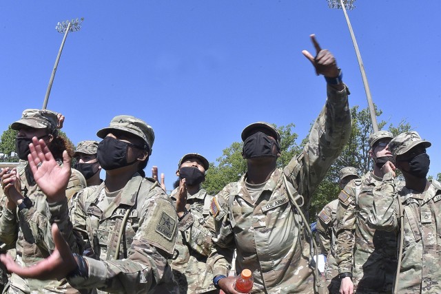 Unit members cheer on their battle buddies during the 23rd Quartermaster Briigade Soldier Stakes Competition May 14 at Williams Stadium.