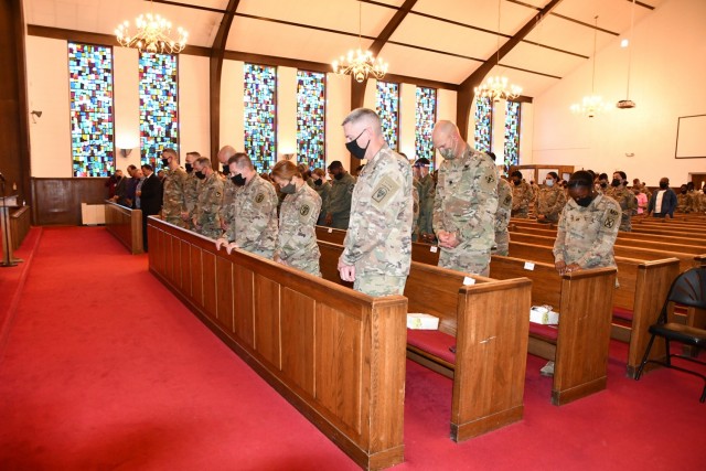 Those attending the Joint Readiness Training Center and Fort Polk National Day of Prayer breakfast, held at the Main Post Chapel May 6, bowed their heads to pray.