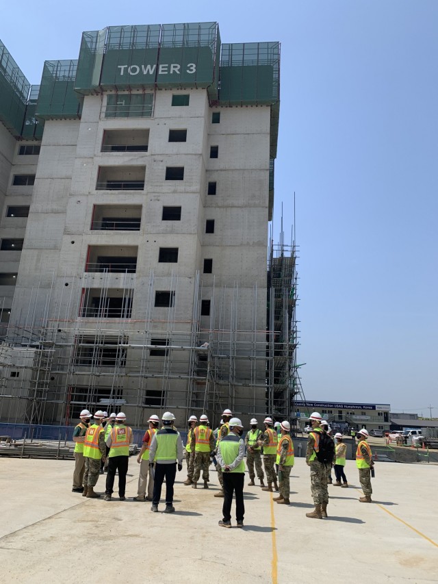 Far East District project site personnel give 11th Engineer Battalion Soldiers a tour of the USAG Humphreys construction site, AFH100, during a visit, May 13. (U.S. Army photo by Sameria Zavala)