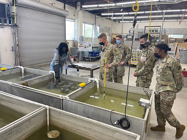 Soldiers from the 46th Engineer Battalion shadow U.S. Army Corps of Engineer workers in New Orleans to train in surveying.
