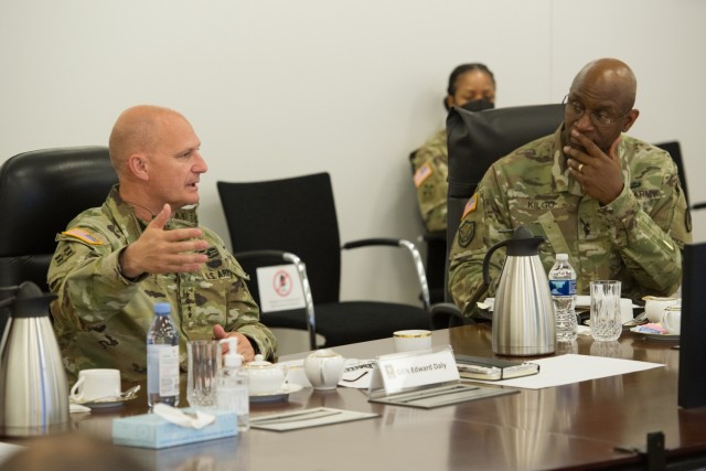 AMC and CECOM commanders talk during quarterly update.