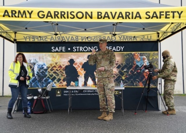 USAG Bavaria Commander Col. Christopher Danbeck shared opening remarks and announced the winning raffle tickets for five Harley Davidson T-Shirt prizes at the USAG Bavaria Motorcycle Mentorship Safety Day, May 14, 2021. (U.S. Army photo by Sidney Sullivan / USAG Bavaria Public Affairs)