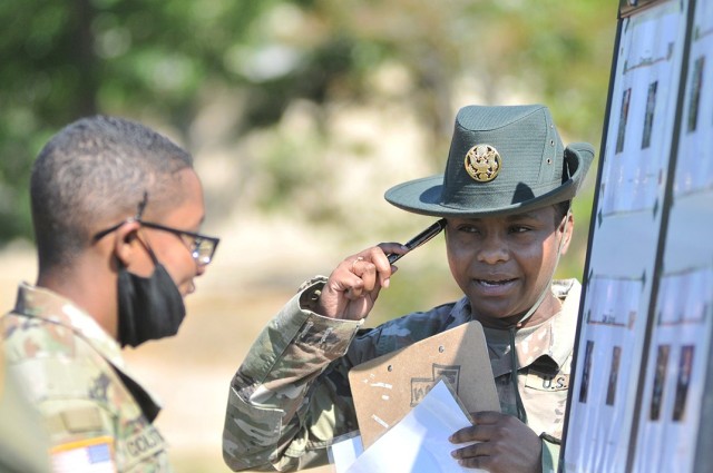 Staff Sgt. Jemima Thornton, a drill sergeant assigned to Mike Company, 266th Quartermaster Battalion, encourages a Soldier to give more effort during the change of command knowledge event of the Soldier Stakes Competition May 14 at Williams Stadium.