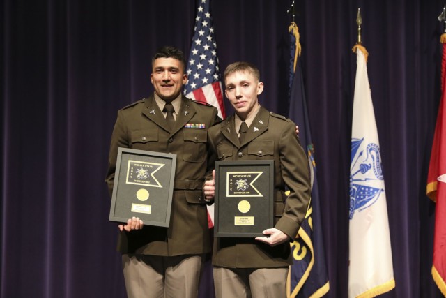 WICHITA, Kan. - Second Lt. José Garcia, Medical Service Corps officer with the 635th Regional Support Group, Kansas Army National Guard, left, and 2nd Lt. Gabriel Schrag,  Nurse Corps, Active Duty, right, became the first Wichita State University...
