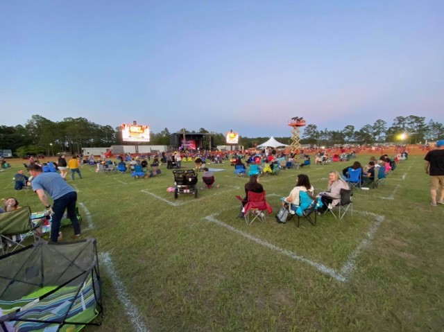 Families spread out on Donovan Field to maintain social distancing requirements during Big & Rich concert, May 15 on Fort Stewart.