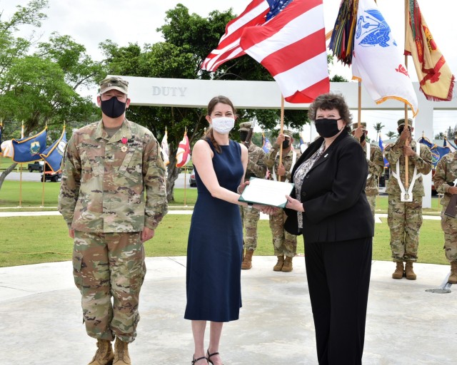 Director of Installation Management Command (IMCOM) – Readiness, Ms. Brenda Lee McCullough presented Dr. Jennifer Corcoran spouse of former Garrison Commander, Col. Joseph B. Corcoran III with a US Army Certificate of Appreciation.