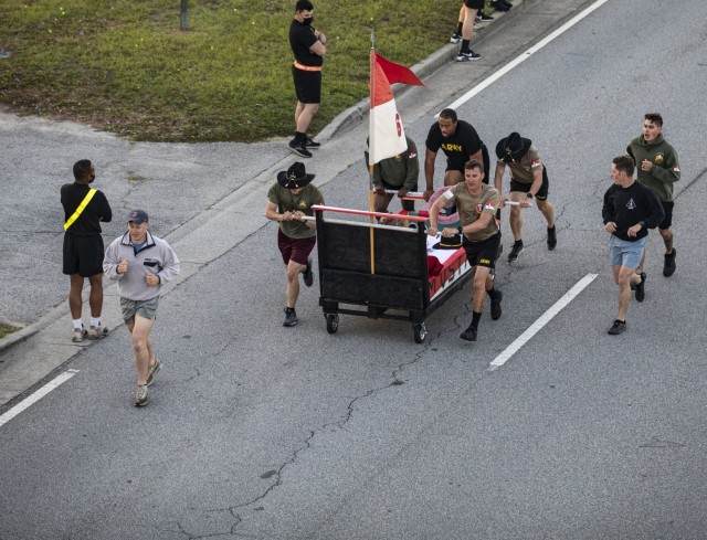 Dogface Soldiers assigned to 6th Squadron, 8th Cavalry Regiment, 2nd Armored Brigade Combat Team, 3rd Infantry Division, push their squadron’s bed during the Bed Race of Marne Week 2021 on Fort Stewart, Georgia, May 17, 2021. The bed race kicks...