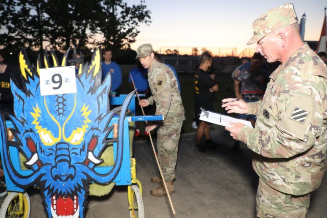 U.S. Soldiers from the 3rd Infantry Division participate in a bed race during Marne Week 2021 at Fort Stewart, Georgia, on May 17. The bed race kicks off this Marne week, standing in as a fun alternative to the traditional division run (U.S. Army...
