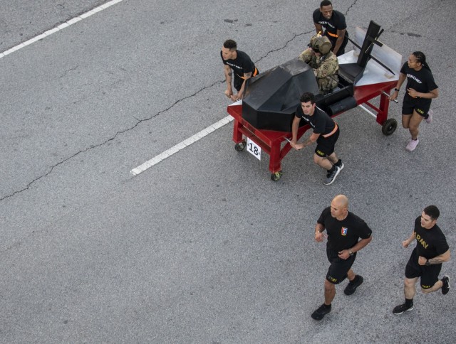 Dogface Soldiers assigned to 3rd Squadron, 17th Cavalry Regiment, 3rd Combat Aviation Brigade, 3rd Infantry Division, push their squadron’s bed during the Bed Race of Marne Week 2021 on Fort Stewart, Georgia, May 17, 2021. The bed race kicks off...