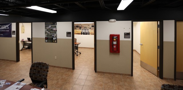 Maj. Gen. John Evans Jr., U.S. Army Cadet Command and Fort Knox commanding general, along with other post leaders tour the recently created military spouse co-work space on the installation May 20, 2021. They also sought and received feedback from...