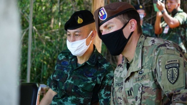 Capt. Matthew Orders, a Team Leader with 1st Battalion, 5th Security Force Assistance Brigade, observes a training event alongside Col. Aekanan Hemabut, the Royal Thai Army 111th Infantry Regimental Combat Team Commander, Aug. 25, 2020, in...