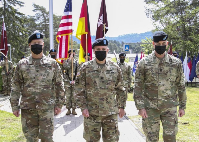 LANDSTUHL, Germany -- (From left) U.S. Army Col. Michael A. Weber, U.S. Army Brig. Gen. Mark W. Thompson, commanding general, Regional Health Command Europe, and U.S. Army Col. Andrew L. Landers, march away from a formation during a change of command ceremony at Landstuhl Regional Medical Center where Weber relinquished command of LRMC to Landers, May 20. Landstuhl Regional Medical Center is the largest American military medical center outside of the United States and plays a strategic role as the sole evacuation and tertiary referral center for five combatant commands.
