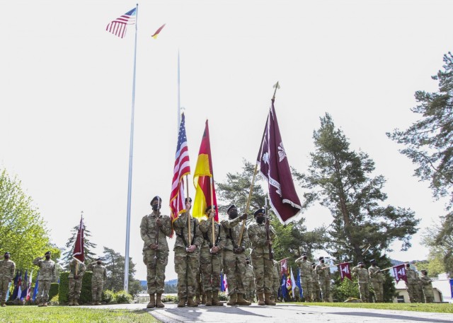 LANDSTUHL, Germany -- The Landstuhl Regional Medical Center Color Guard presents the colors during the playing of the German and United States National Anthems during a change of command ceremony at LRMC where U.S. Army Col. Michael A. Weber relinquished command of LRMC to U.S. Army Col. Andrew L. Landers, May 20. Landstuhl Regional Medical Center is the largest American military medical center outside of the United States and plays a strategic role as the sole evacuation and tertiary referral center for five combatant commands.