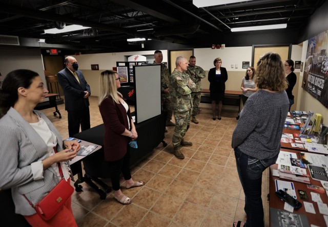 Maj. Gen. John Evans Jr., U.S. Army Cadet Command and Fort Knox commanding general, along with other post leaders tour the recently created military spouse co-work space on the installation May 20, 2021. They also sought and received feedback from...