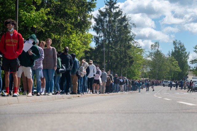 Hundreds of families line up for the COVID-19 vaccine at Patch Barracks, near Stuttgart, Germany, May 22, 2021.