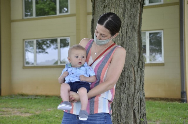 Gage Brisson, 6 months old, spends some quality time with his mother Grace, roughly half a year after undergoing surgery for a congenital heart defect. Soldiers and civilians from Blanchfield Army Community Hospital were recognized May 12 with a...