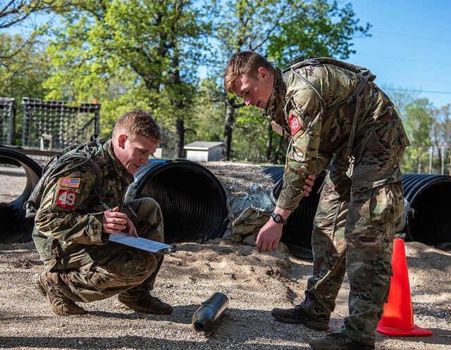 Class of 2021 Cadets Collin Hahn (left) and Griffin Hokanson (right) conducted unexploded ordnance identification during the 14th annual Lt. Gen. Robert B. Flowers Best Sapper Competition May 3 at Fort Leonard Wood, Mo. With limited time to...