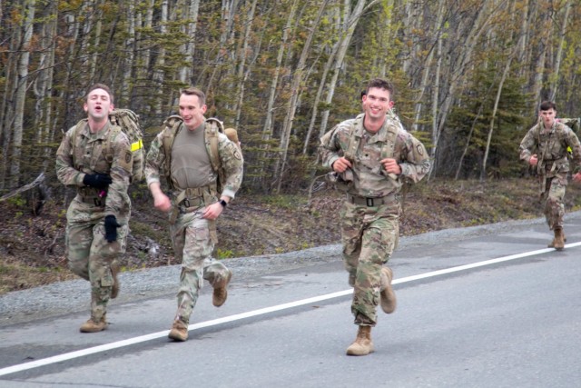 Paratroopers with the 1st Squadron, 40th Cavalry Regiment (Airborne), 4th Infantry Brigade Combat Team (Airborne), 25th Infantry Division, finish their first mile of the Norwegian Foot March at Joint Base Elmendorf-Richardson, May 20, 2021. Of the approximately 170 participants that started 130 finished the 18-mile march successfully. (U.S. Army photo by Staff Sgt. Alexander Skripnichuk)