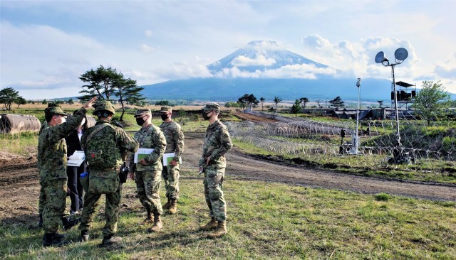 Col. Thomas J. Verell, Jr., JED Commander, Maj. Bobby Johnson, JED deputy commander, and Capt. William Barlaan, JED operations officer, are given a tour of Kita Fuji, the Japan Gran Self Defense Force training aria by Maj. Tanaka Hiroaki,...