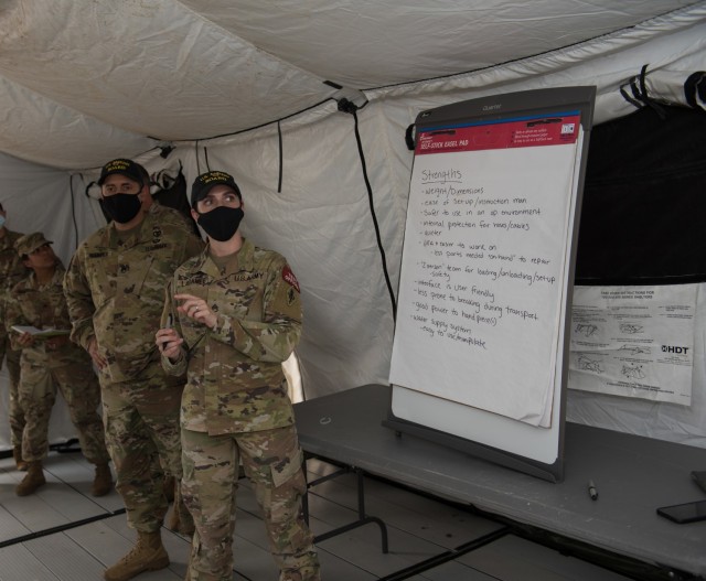 Staff Sgt. Tara Laramee, a test officer with the U.S. Army Medical Test and Evaluation Activity, annotates feedback from recent equipment testing.  Soldiers from the 502nd Dental Company Area Support helped test the Dental Operating System May 18-20. Currently not fielded, the testing results for the modernized system will inform, if and when, it is available to the force to provide dental care to human service members and military working dogs.