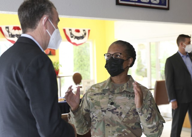 Gov. Ralph Northam, governor of Virginia, talks with U.S. Army Lt. Col. Brenda Meredith, commander of the 7238th Medical Support Unit, Deployed Warrior Medical Management Center, during a visit and tour at Landstuhl Regional Medical Center, May 20. Northam, a child neurologist, was previously stationed at LRMC during the height of Operation Desert Storm in the early 90s.