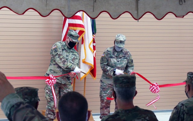 Col. Thomas J. Verell, Jr., Japan Engineer District commander, and Lt. Col. Rosanna Clemente, 1st Battalion, 1st ADA commander, cut the ribbon, officially opening the most advanced Patriot Missile Storage Facility in the world.