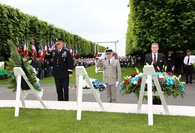 MG Timothy McGuire, then Deputy Commanding General of U.S. Army Europe, joins French military leaders on May 27, 2018, to pay tribute to fallen service members at St. Mihiel American Cemetery and Memorial, located at the western edge of Thiaucourt, France. The 40.5-acre cemetery contains the graves of 4,153 American military dead from World War I.